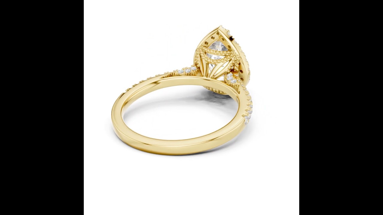 Vintage Inspired Pear Cut Halo Wedding Ring