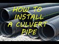 Installing a small culvert pipe - YouTube