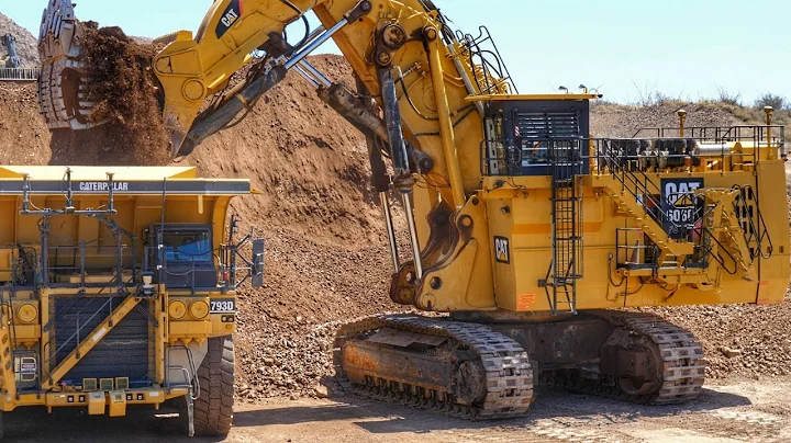Caterpillar 6060 Face Shovel loading Autonomous Trucks