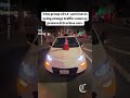 Group of S.F. activists protest driverless cars using orange traffic cones