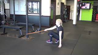 banded knee tuck exercise