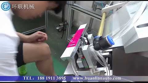 Lollipop labeling machine with date printed in Food Production