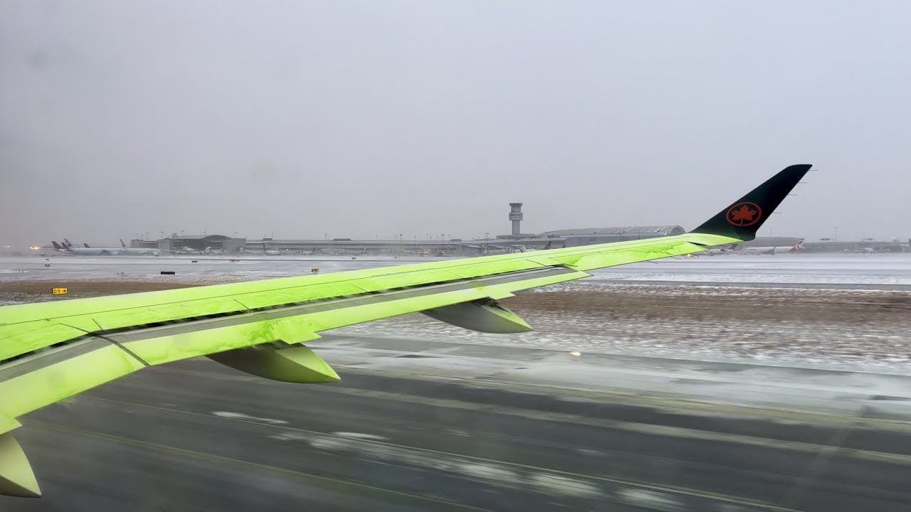 Air Canada Airbus A220-300 Crazy Windy Snowstorm Takeoff from Toronto Pearson | YYZ-YOW