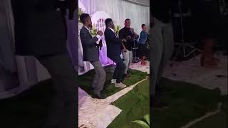 Pastor David and Happy Alex Dancing at Ficia namulanda