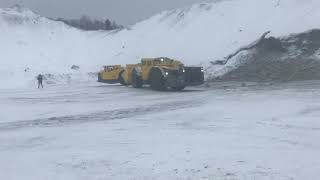 Epiroc Minetruck MT42 being loaded by ST14, tailgate option demonstrated
