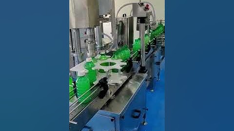 AUTOMATIC TWO HEAD LIQUID FILLING LINE - Pesticides filling