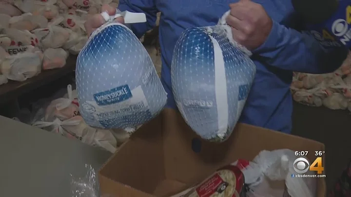 Volunteers Of America Prepare Thanksgiving Baskets For Families