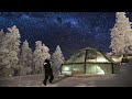 Questce que a fait de dormir dans un igloo dans la neige sous les toiles 