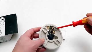 Menards Lamp Holder With 3-Prong Outlet (Fire Hazard!)