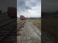 Norfolk Southern Engine carrying CPKC Autoracks