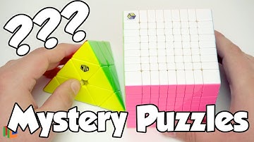New Mystery Puzzles Unboxing (Yuxin HuangLong 9x9 and X-Man Bell Pyraminx) | TheCubicle.us