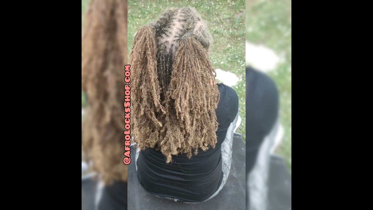 skull viking beads with red eyes on tiny micro locks sisterlocks dreadlocks