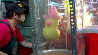 Cotton Candy Art: Duck with red hat on top