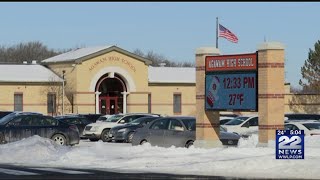 How do school districts determine a school delay?