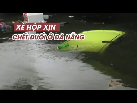 Video Xế hộp chìm nghỉm dưới hầm xe trong trận mưa kỷ lục ở... - youtube