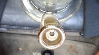 Dunking a dab of wax HD close up