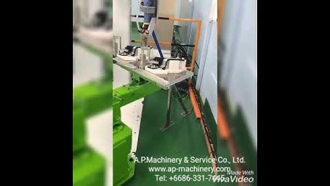 Robot with auto screw feeder machine.
