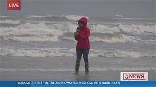 Simone Simpson shows us how high the tides are at Whitecap Beach during TS Harold