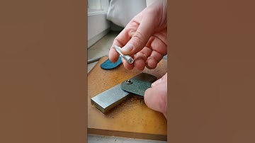 How to punch a snap button by hand with some leathercraft tools and elbow grease.
