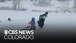 Despite power outages in Denver metro area, many Coloradans enjoy the snow day
