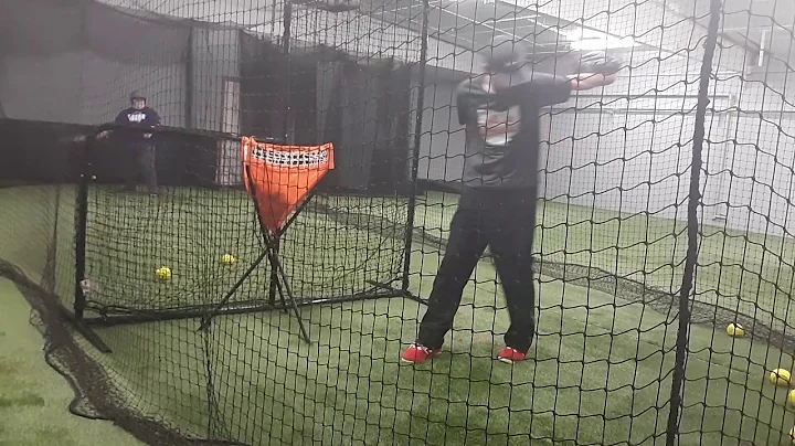 Jenny whaley is up to bat at the batting cages