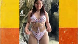 Chubby beach bikini dancer