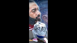 6ix9ine Pulls Up On a Nipsey Hussle Mural!! & shows respect...