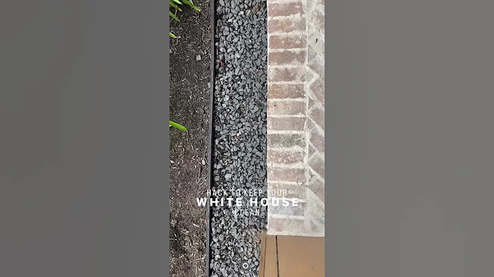 Create a 12” rock border between the foundation and mulched flower beds. Credit: @triplecfarmhouse