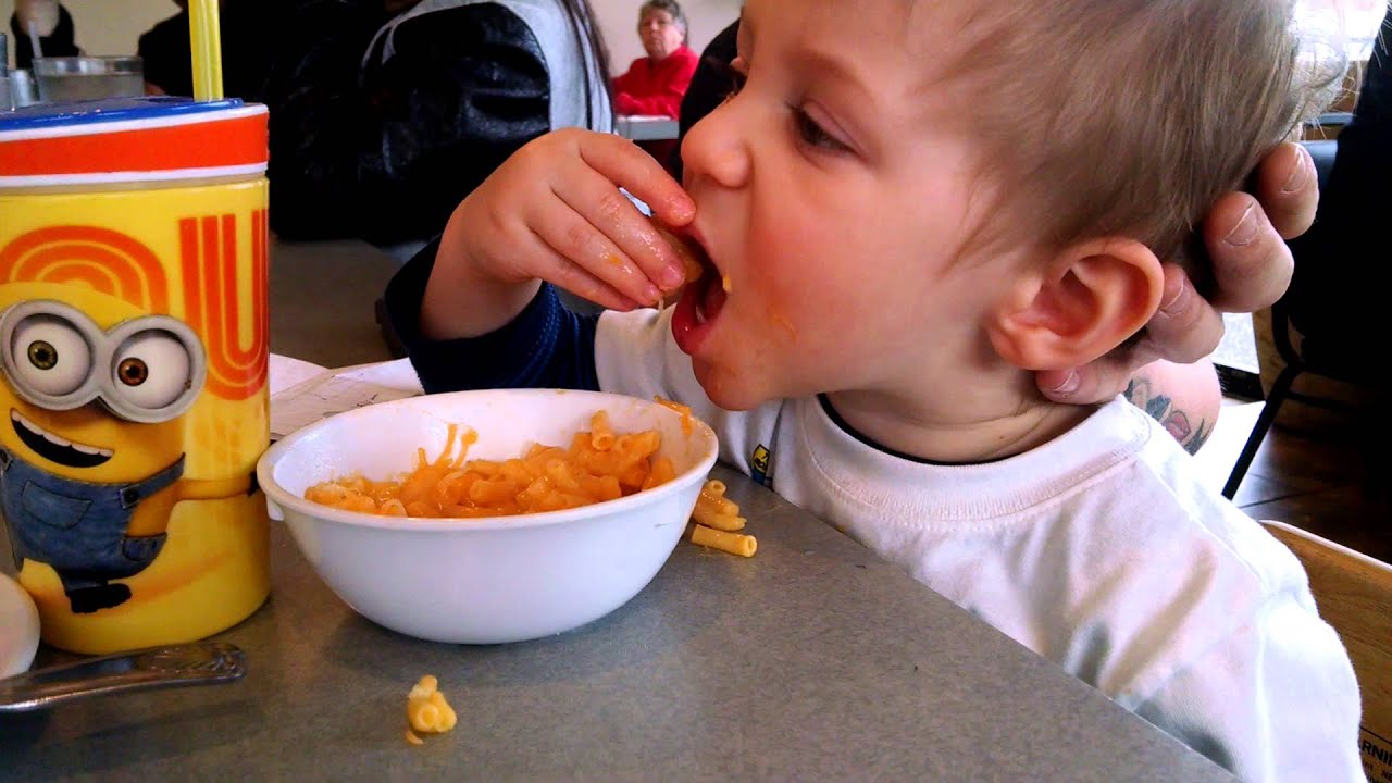 Tired baby eating Mac and cheese YouTube