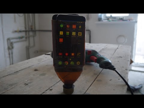 Video: Kuinka tehdä puhelinteline? Kätevä improvisoiduista materiaaleista valmistettu vempain