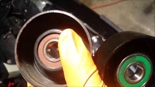 Jaguar XJ8 Belt Idler & Tensioner Pulley for the accessory drive system.