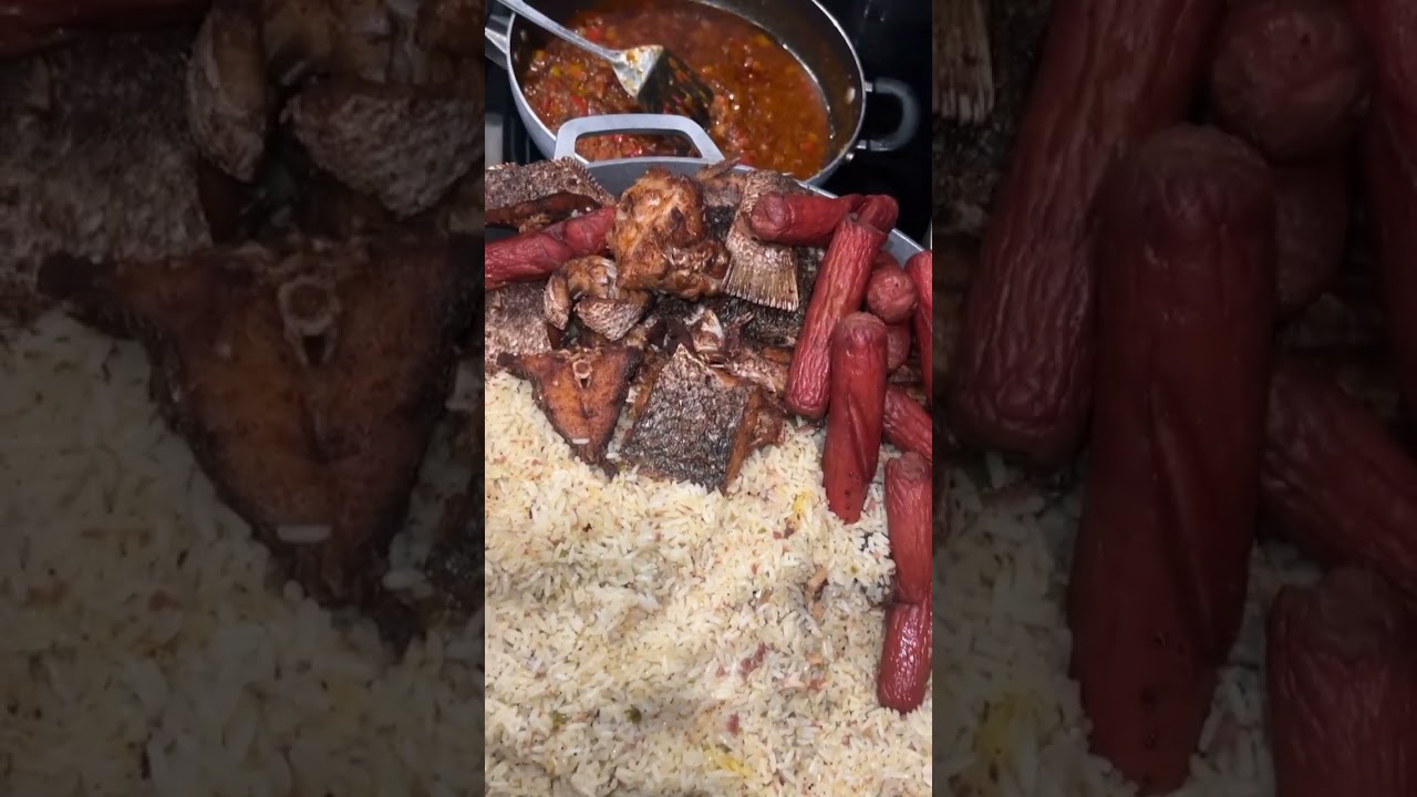 Liberian dry rice with sauce, sausage and Fish😋😋😋 so delicious