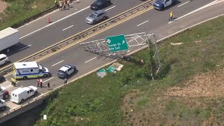 Dump truck hit overhead traffic sign that fell, closed lanes on I-440 near Hillsborough Street