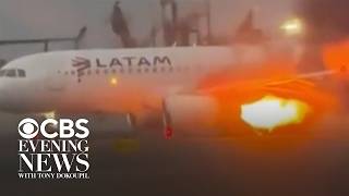 Plane engine shoots flames before takeoff from Lima, Peru