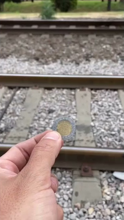Menaruh Koin Di Atas Rel Kereta