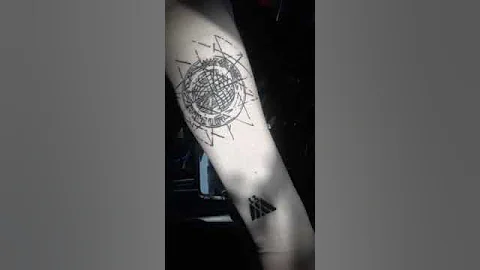Destiny themed tattoo on arm