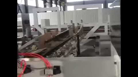 Automatic carton stitcher machine