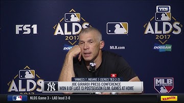 An emotional Joe Girardi speaks to the media