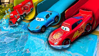 Looking for Disney Pixar Cars On the Rocky Road : Lightning McQueen, Mater, Dinoco McQueen, Mack