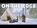 WINTER CAMPING during a SNOWSTORM at the EDGE of a CLIFF / CANVAS CABIN TENT, WOOD STOVE and my DOG
