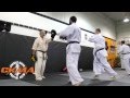 Adult kyokushin karate at contact kicks martial arts dojo