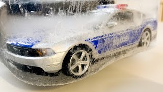 She's covered in ice!  Police Model Cars Getting Frozen And Unfrozen