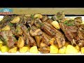 Costillas de cerdo al ajillo con champiñones y patatas, receta fácil y económica - Loli Domínguez