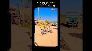 A Young Woman In A Sari Performs Stunts On A Bike...???