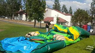 Jumper life: How to roll up a huge inflatable 18' dual Lane water slide bouncer all by yourself