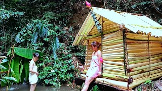 @2Girls2024 girl They built a camp next to a small stream in the tropical forest