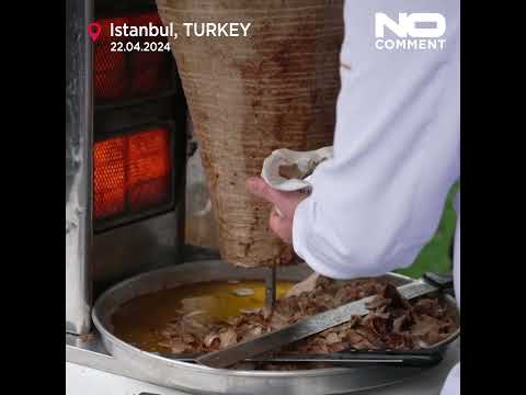 German President Steinmeier practices cutting Döner Kebab in Istanbul