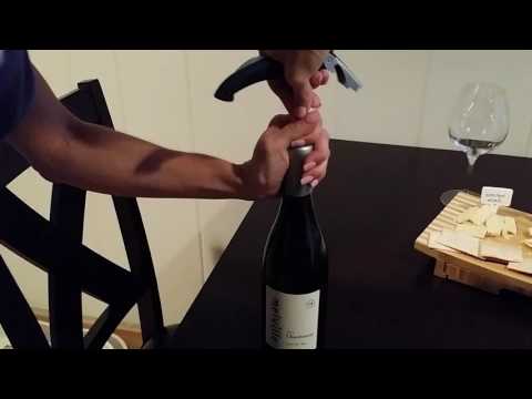 How to open a wine bottle with a wax seal.
