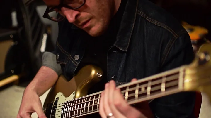 Gold sparkle jazz bass in the studio with Ian Alli...