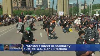 Protesters 'Take A Knee' Over The Killing Of George Floyd